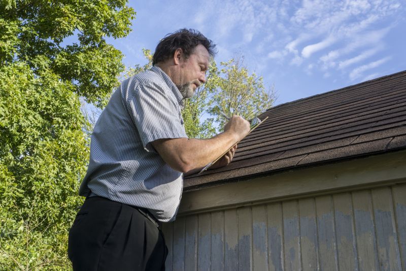 Contractor Inspecting Roof